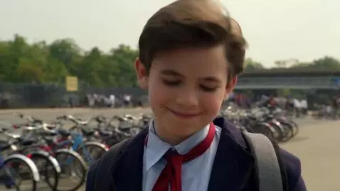 AI Video from prompt: [Scene: A 90s school boy with a backpack, standi