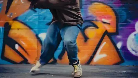 AI Video from prompt: a man breakdancing