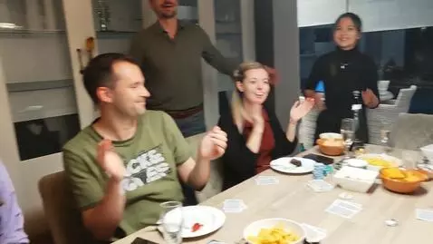 AI Video from prompt: all the people are celebrating chance the backgr
