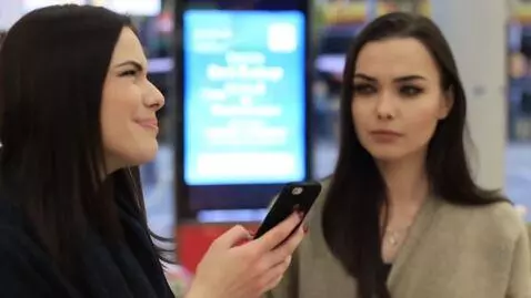 AI Video from prompt: In the foreground is a young woman of Slavic app