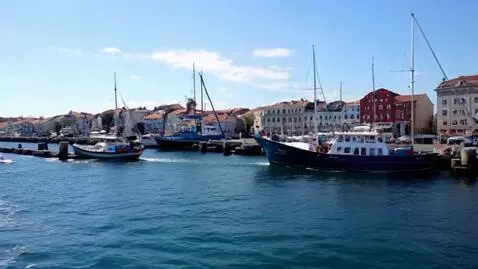 AI Video from prompt: boat entering harbor