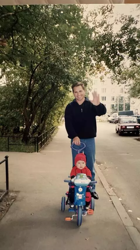 AI Video from prompt: A man is carefully riding a bicycle with a girl.