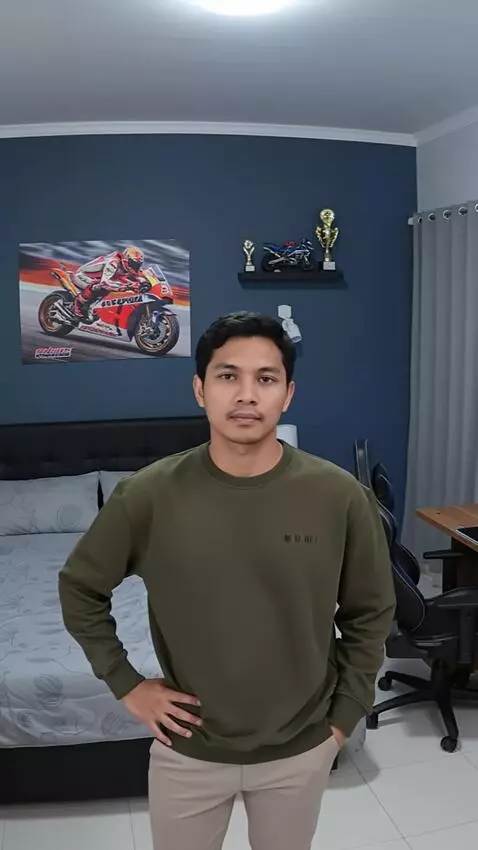 AI Video from prompt: A man standing in a room, posing as if looking i