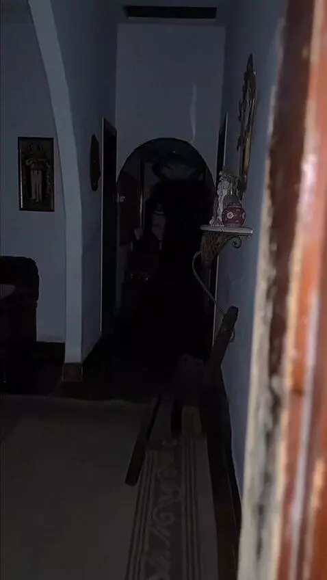 AI Video from prompt: A silhouette at the far end of the corridor - a 