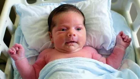 AI Video from prompt: funny mock interview with a newborn baby on thei