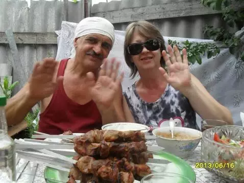 AI Video from prompt: Loving people outdoors waving their hands. Photo