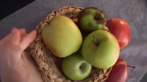 AI Video from prompt: Apple eating g a apple