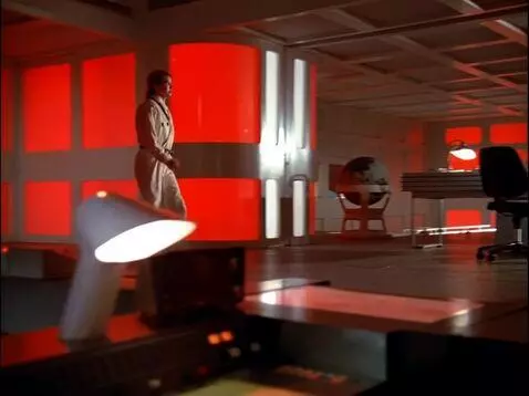 AI Video from prompt: woman dressed in a space station uniform walks a