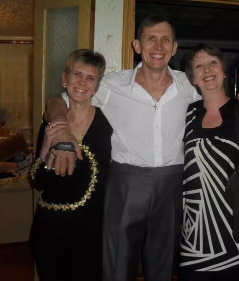 AI Video from prompt: > **Prompt:** > *Three people are standing close