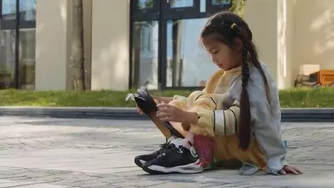 AI Video from prompt: Young girl crosses legs