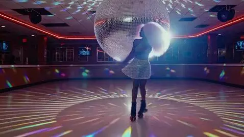AI Video from prompt: A woman with pink cotton candy hair roller skate