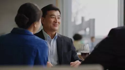 AI Video from prompt: A male journalist is greeting everyone