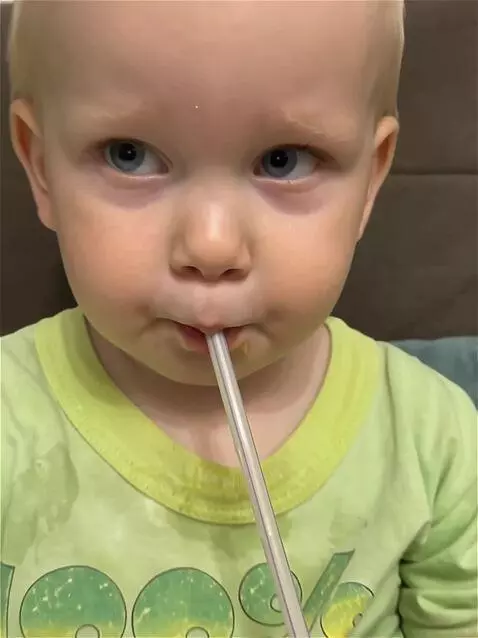 AI Video from prompt: A slight camera zoom in on the child's face. The