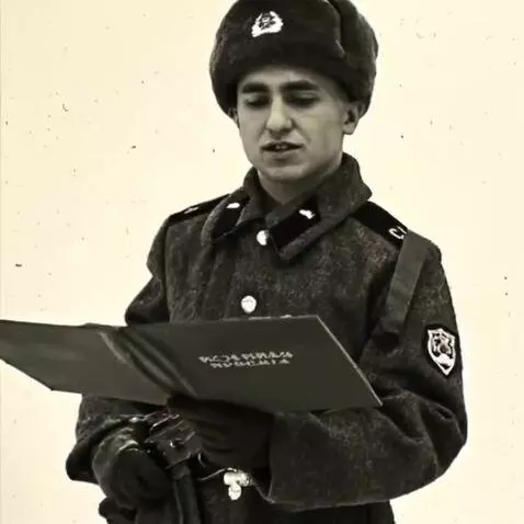 AI Video from prompt: The man stands quietly and reads the text from t