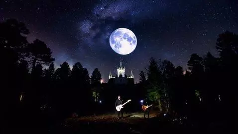 AI Video from prompt: Create a video of a black metal band playing gui