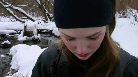 AI Video from prompt: A pretty young Russian woman looks fearfully at 