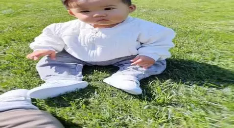 AI Video from prompt: The baby is 10 months old, come up with a creati