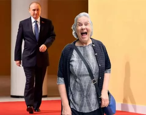 AI Video from prompt: Funny meme-style video: An elderly woman walks d