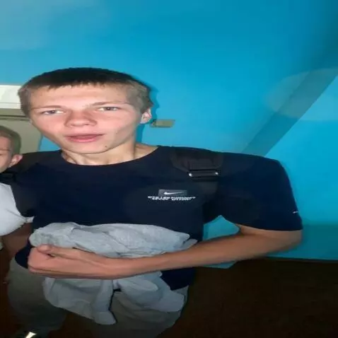 AI Video from prompt: Make this person in the photo belch from a MTZ B