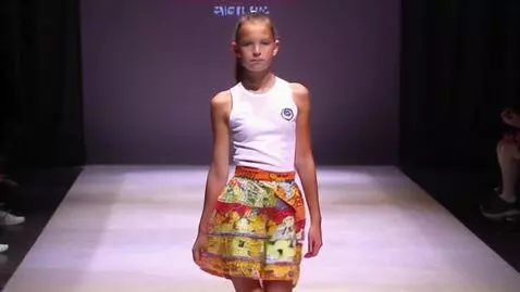 AI Video from prompt: Girl walking on runway while wearing a tank top 