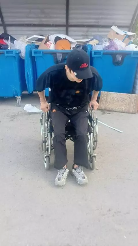 AI Video from prompt: This cool guy gets up from his wheelchair and lo