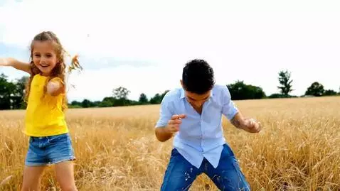 AI Video from prompt: a girl and a man dance together