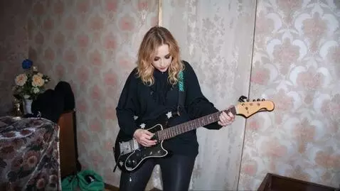 AI Video from prompt: A pretty young woman with a beautiful physique a