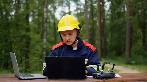 AI Video from prompt: drone is being manufactured, then the guy dresse