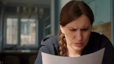 AI Video from prompt: Volodymyr Zelenskyy, in a sad mood, reads the te