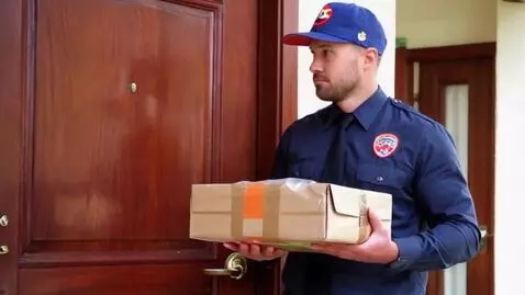 AI Video from prompt: A McDonald's delivery man with a package rings a