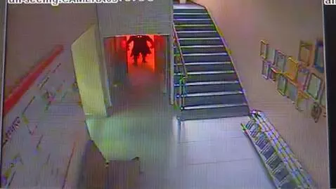 AI Video from prompt: smoke comes out of the red room, a devil with a 