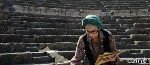 AI Video from prompt: bends down sharply to pick up the notes and plac