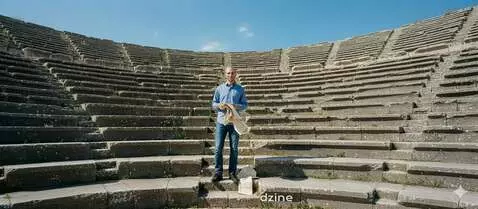 AI Video from prompt: The man waves his hand