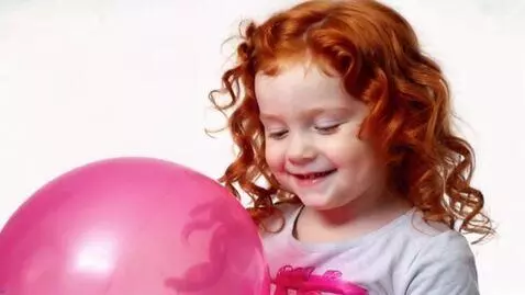 AI Video from prompt: redhead curly chubby girl intense riding baloon 