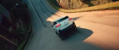 AI Video from prompt: The car goes at full speed in the street and the