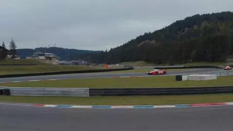 AI Video from prompt: “На гоночной трассе днём тёмно-синяя Лада Гранта