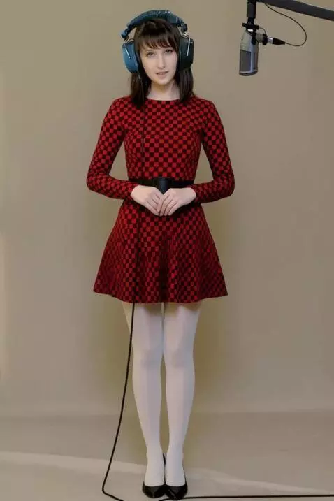 AI Video from prompt: A young woman in a recording studio. Listening t