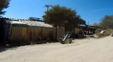 AI Video from prompt: Freddy Krueger clears metal with his knives. Dar