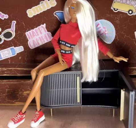 AI Video from prompt: The girl gets up, squats down and opens the dres