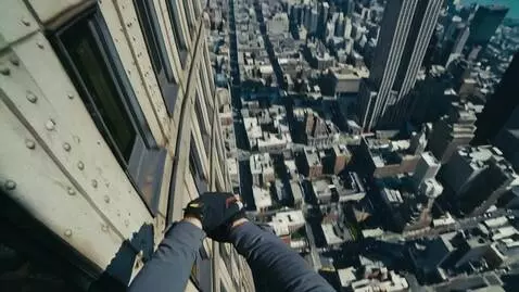 AI Video from prompt: POV you are climbing up the side of the Empire S