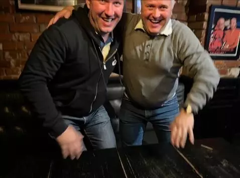 AI Video from prompt: men jump on the table and start dancing