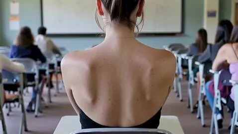 AI Video from prompt: Anya is sitting in the classroom in a Raserback 