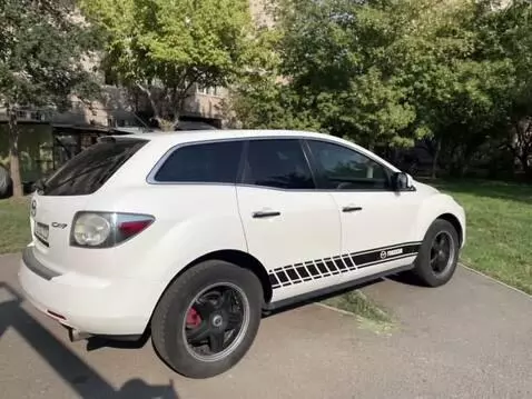 AI Video from prompt: The sexy girls are washing the car.