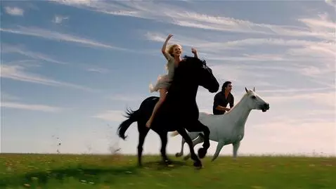 AI Video from prompt: Photorealistic dynamic scene, beautiful blonde w