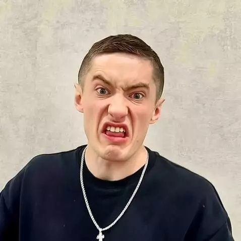 AI Video from prompt: он притворяется, что разозлился, кричит (аж пена