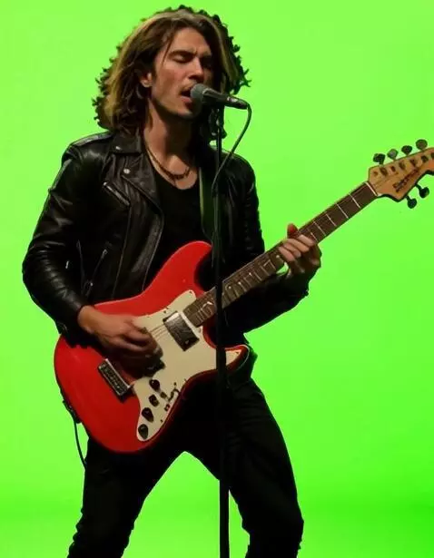 AI Video from prompt: The guitarist plays and sings passionately, sway