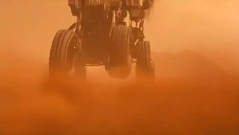 AI Video from prompt: Tesla Cybertruck speeds along the sandy roads of