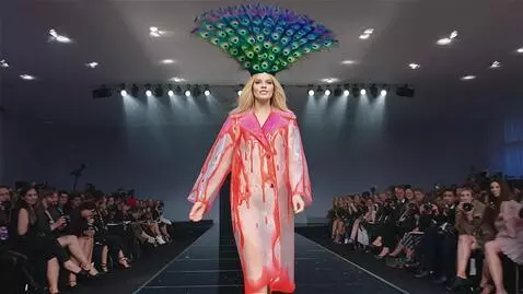 AI Video from prompt: A famous female blonde model walks the fashion s