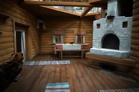 AI Video from prompt: A steady camera, a static shot. A fire burns in 