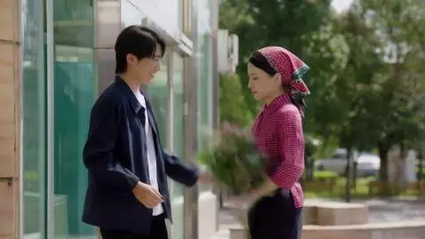 AI Video from prompt: A young man gives flowers to a girl outside a bu